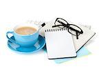 Blue coffee cup, glasses and office supplies. Isolated on white background