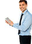 Businessman holding electronic touch pad tablet isolated against white background