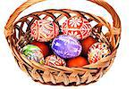 Detail of the painted Easter Eggs in wicker basket - basket full of Ester Eggs