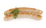 Two grilled sausages with dill. Isolated on white background