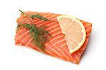 Fresh salmon steak with lemon slice and dill. Isolated on white background