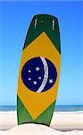 brazilian flag painted on a kite surf board with "praia e vento" (beach and wind) instead of "ordem e progresso"  in prainha beach near fortaleza