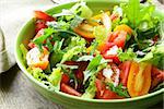 fresh healthy salad with tomatoes and arugula