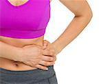 Closeup on woman with stomach pain