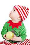 Small baby in santa suit with apple. Closeup, isolated on white