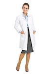 Full length portrait of woman ophthalmologist doctor wearing glasses