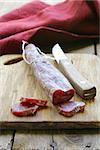 Still life of delicacy salami - rustic style