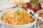 Biryani rice or briyani rice, fresh cooked, traditional indian food on dining table.