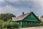 Traditional green wooden house in Trakai, Lithuania