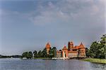 Trakai red brick castle in lake Galve