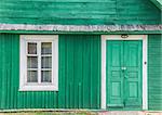Detail of a traditional green wooden house in Trakai, Lithuania