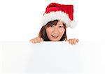 Christmas girl with sign. Beautiful mixed race Asian Chinese / Japanese  woman with billboard looking surprised. Isolated on white background.