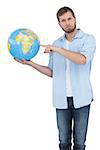 Charming model on white background holding a globe on right hand