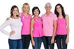 Women wearing pink for breast cancer awareness on white background