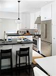 Home Interior of White and Stainless Steel Kitchen, Toronto, Ontario, Canada