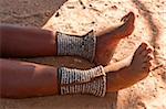 Legs of Himba woman, Kaokoveld, Namibia, Africa