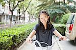 Young Girl Riding Her Bicycle