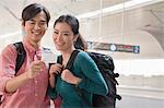 Young Couple Checking Their Train Ticket