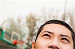 Young man on the basketball court, portrait