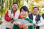 Multi-generational men fishing portrait