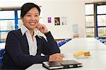 Young business woman in company cafeteria