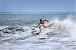 Man-surfer in ocean. Bali. Indonesia