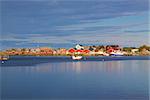 Industrial fishing port in Reine on Lofoten islands in Norway during summer