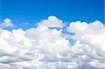 Beautiful fluffy white clouds on blue sky.