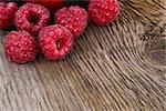 Fresh Ripe Sweet Raspberry on Wooden Background. Fresh Organic Food. Space for Text