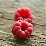 Fresh Ripe Sweet Raspberry on Wooden Background. Fresh Organic Food. Closeup