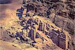 View of ancient tombs carved in the rock in Petra, Jordan