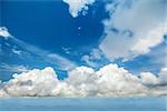 View on Cumulus Clouds in the bright blue sky