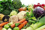 Various dirty vegetables representing healthy food.