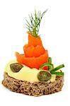 Gourmet Snack with Smoked Salmon, Cheese Cream, Greens, Capers and Whole Grain Bread isolated on white
