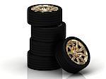 Five black wheels with gold discs stacked