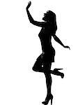 stylish silhouette caucasian beautiful woman dancing happy fun full length on studio isolated white background