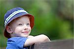 cute smiling boy in a sunhat outdoors