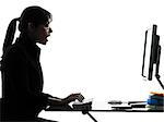one business woman computer computing typing surprised  silhouette studio isolated on white background