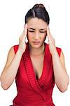 Sexy tied haired brunette having headache while posing on white background