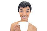 Content black haired woman holding a cup of coffee on white background