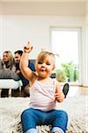 Family in Living Room at Home, Mannheim, Baden-Wurttemberg, Germany