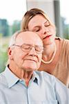 Young Woman and Senior Man with Eyes Closed, Mannheim, Baden-Wurttemberg, Germany