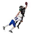 Two male players of American football fighting for ball, studio shot