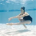 USA, Utah, Orem, Female ballet dancer under water