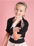 Portrait of girl (10-11) in 1950s style costume for Halloween