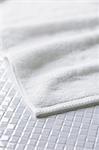 White towel on tiled floor