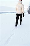 Woman walking in snow