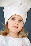 Little girl with chef's hat, Munich, Bavaria, Germany