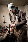 Blacksmith shaping iron, Landshut, Bavaria, Germany