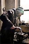 Blacksmith bending iron, Landshut, Bavaria, Germany